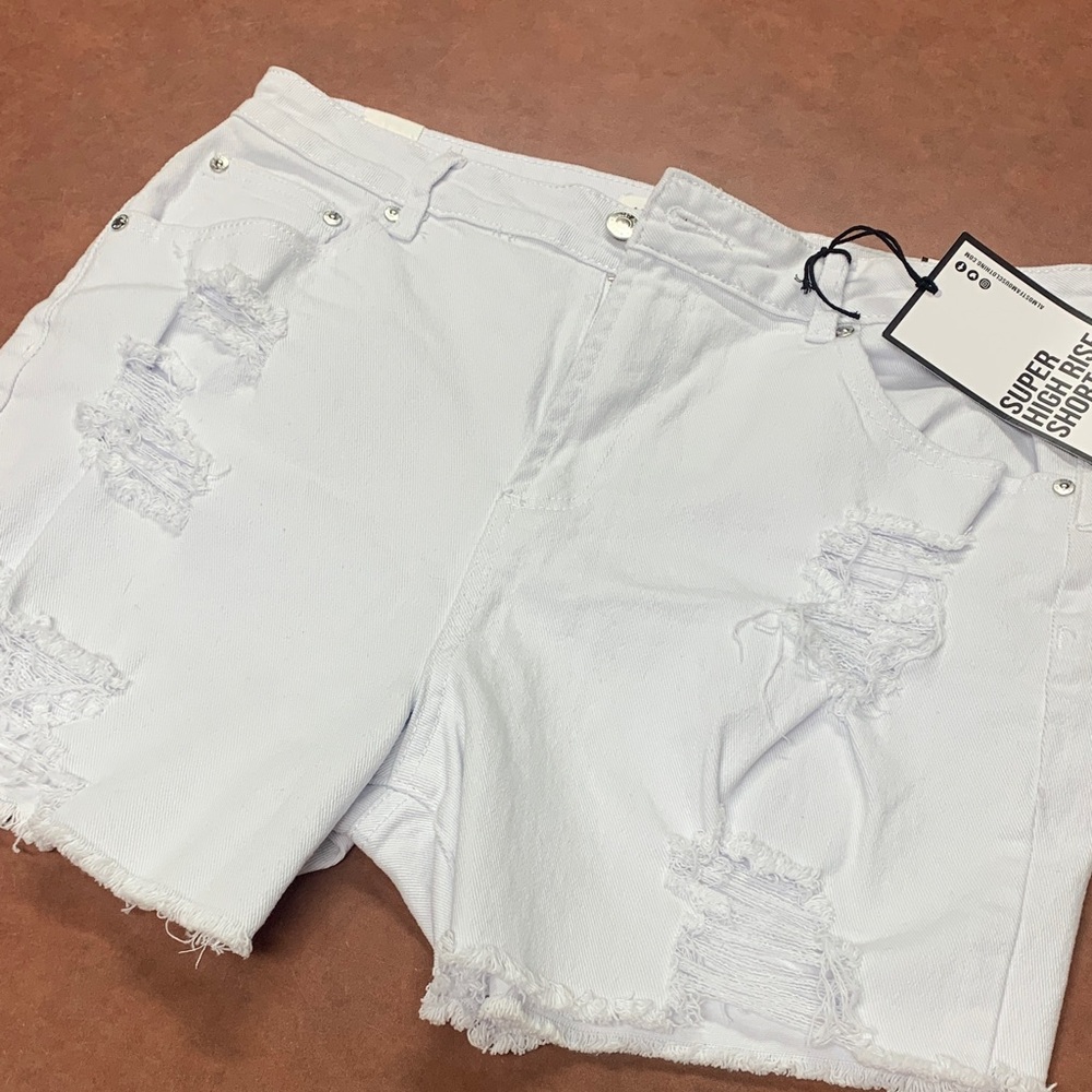 White ripped Bermuda jean shorts